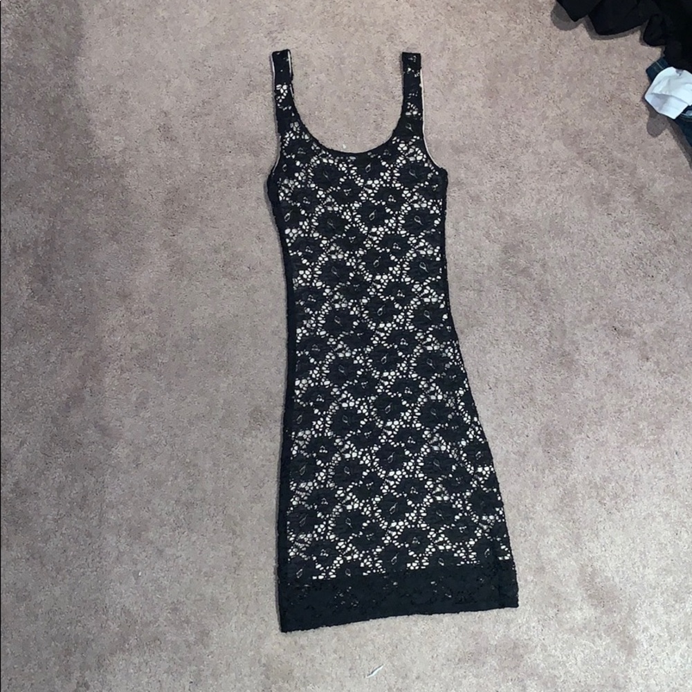Brand is “Socialite” mid dress. Black lace.